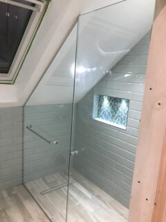 loft shower enclosure angled glass door