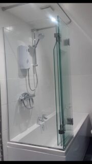 Bifold shower screen folded up - Bespoke over bath shower screens